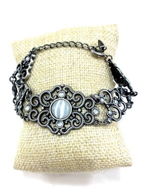 Delicate Silver-Tone Filigree Bracelet with Pale Blue Stone